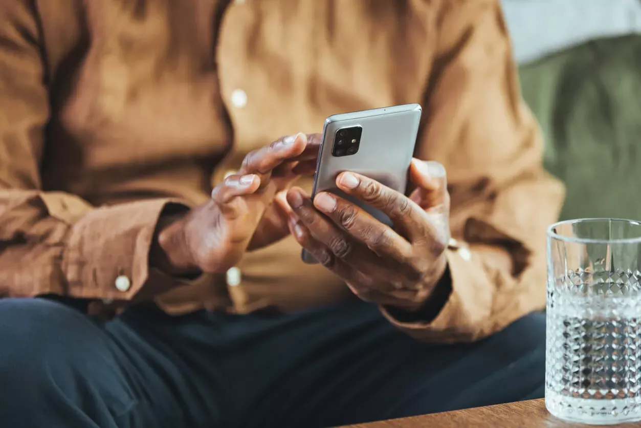 Man navigating phone screen
